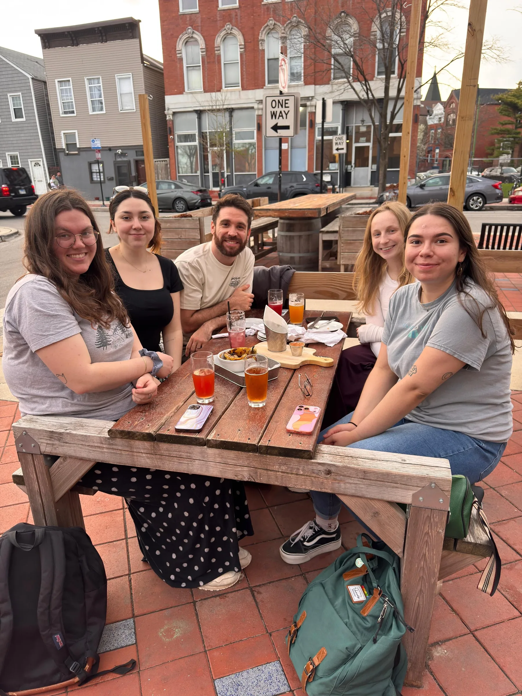 Lab members at a patio table during a lab outing