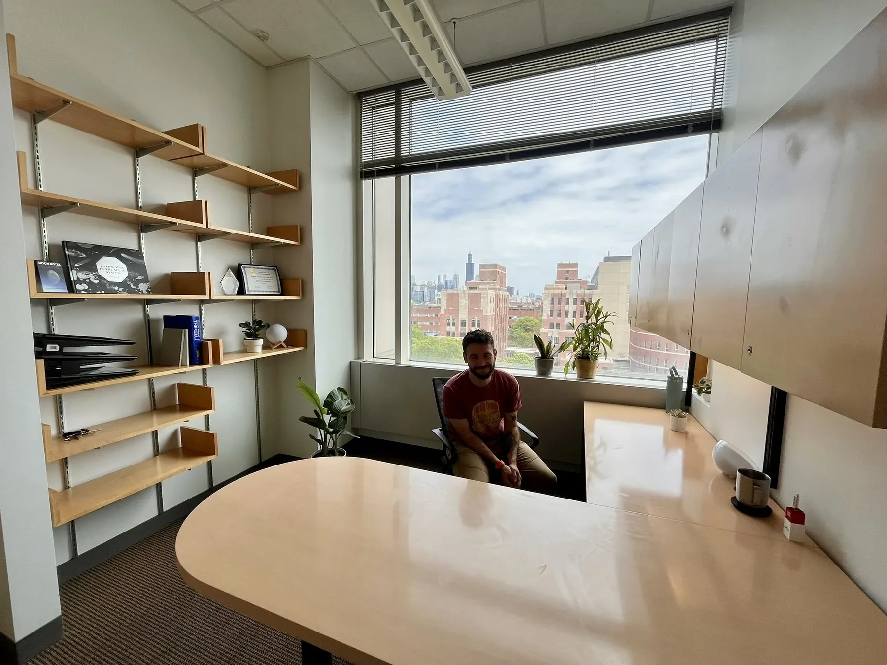 The new lab office in the UIC Department of Anatomy and Cell Biology, with a window over Chicago