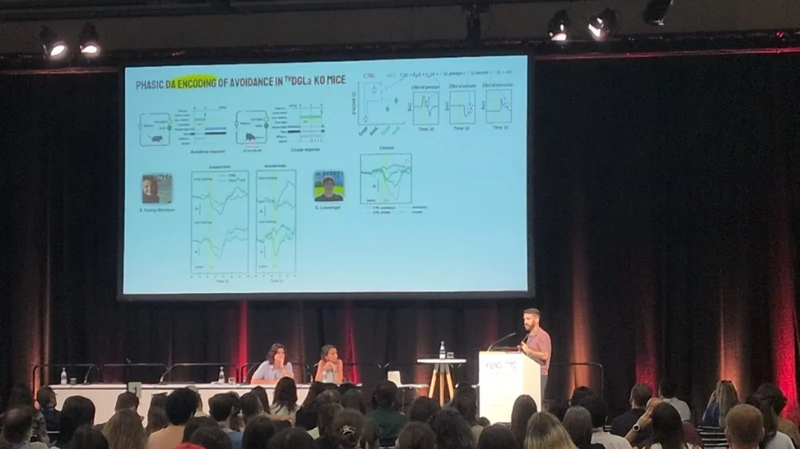 Miguel presenting lab data on stage at the FENS meeting
